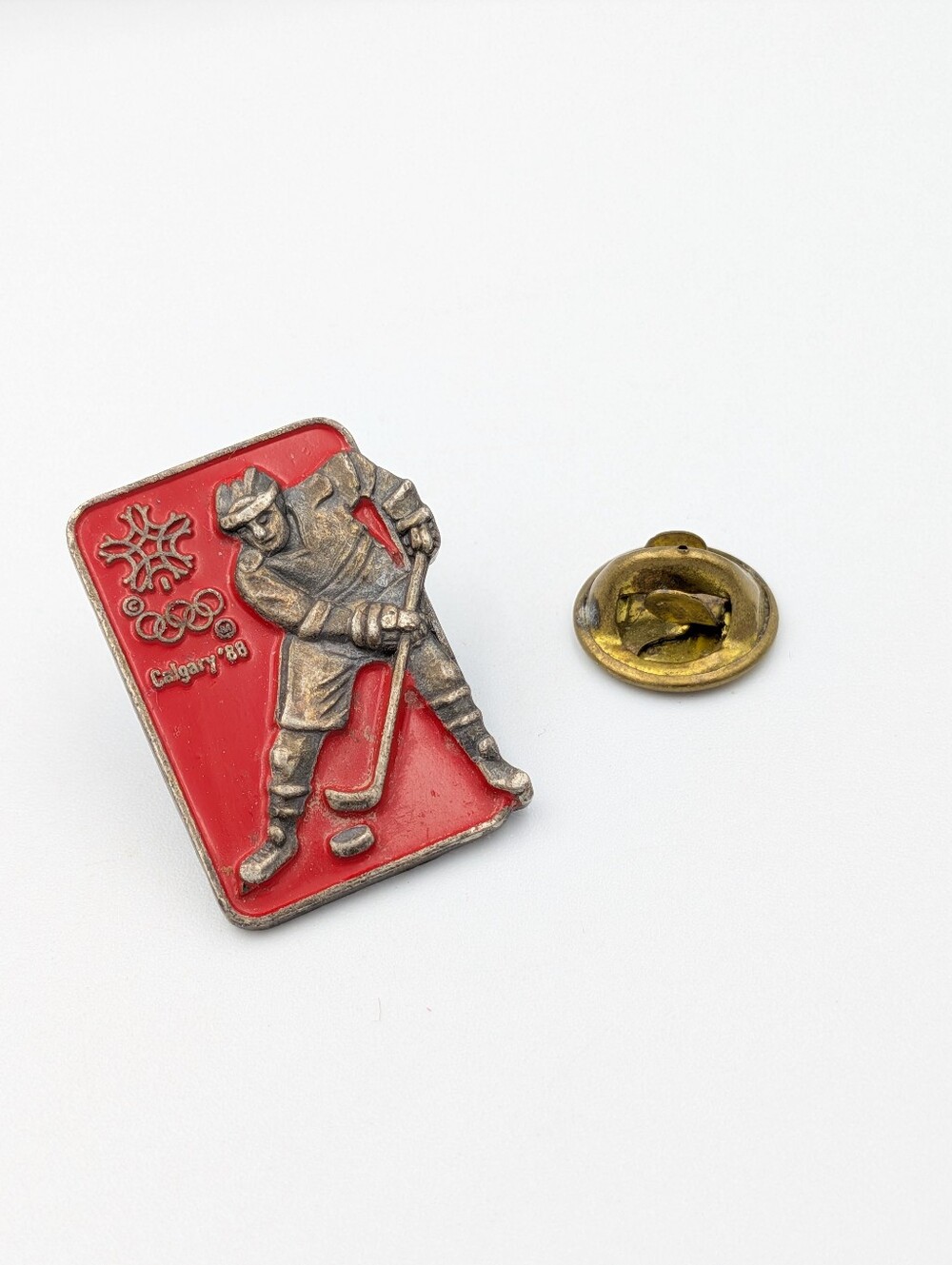 Vintage Calgary 1988 Winter Olympics ice hockey red enamel pin